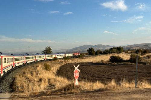 Train rounding a bend in the tracks, Pakistan, Selective Asia